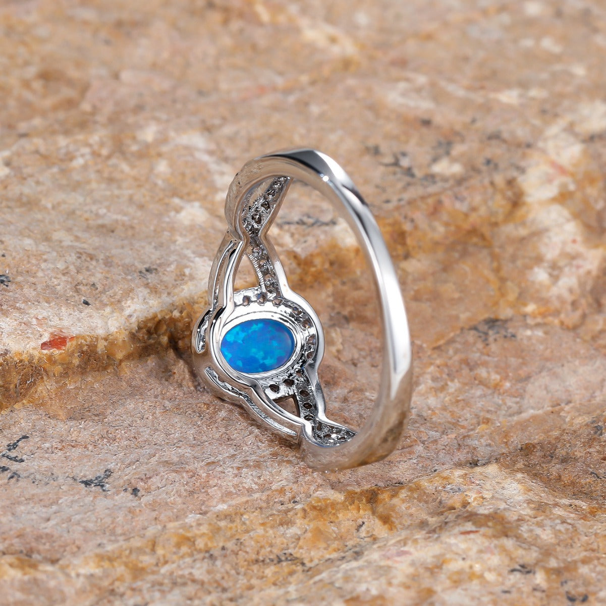 Artistic Retro White K Egg-shaped Blue Opal Edge White Diamond Lace Ring