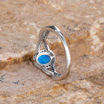 Artistic Retro White K Egg-shaped Blue Opal Edge White Diamond Lace Ring